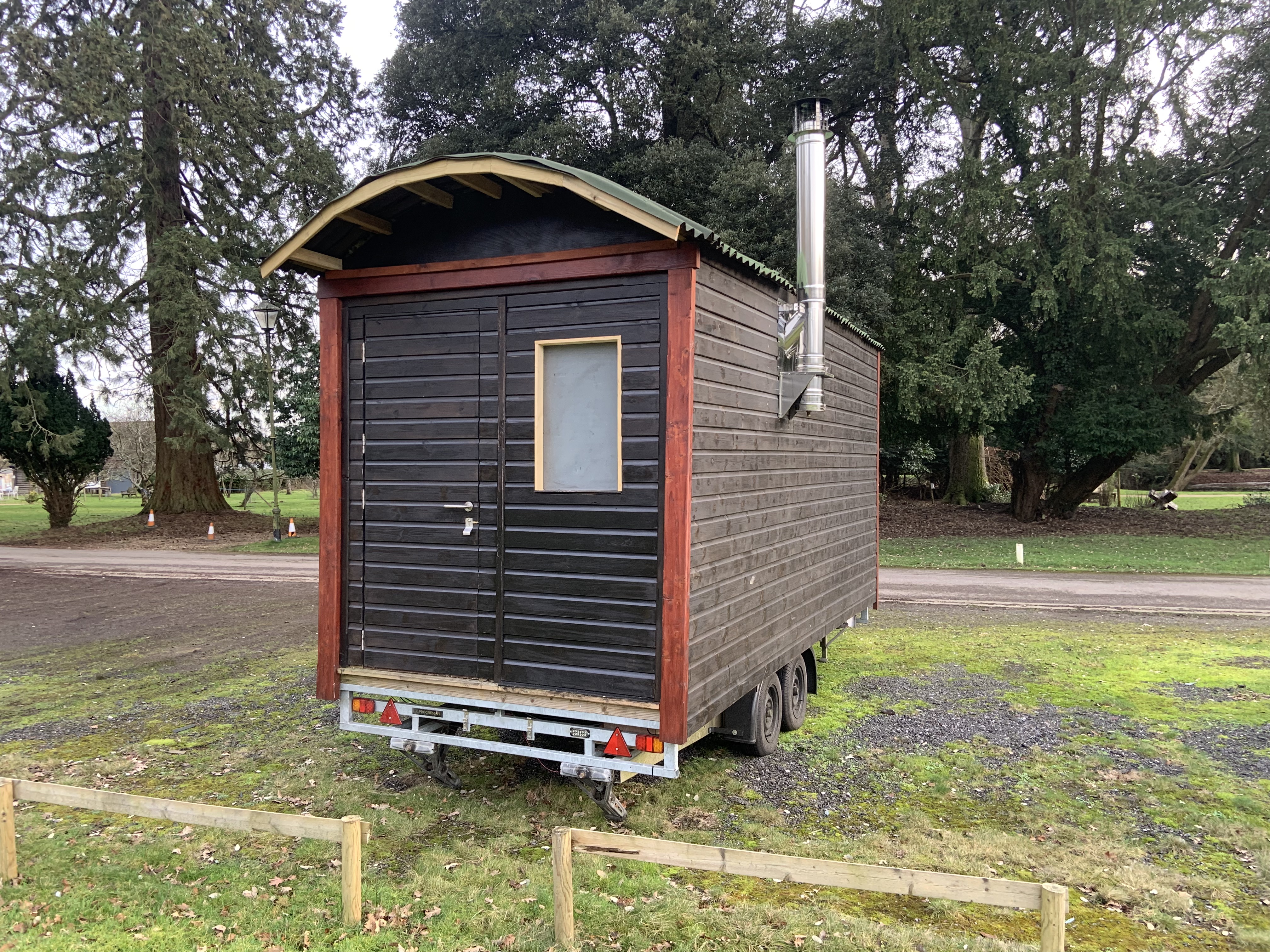 OG Sauna Co wood-fired sauna set in a natural outdoor setting